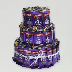 Dairy Milk Chocolate & Eclairs Arrangement Dairy Milk Chocolate & Eclairs Arrangement