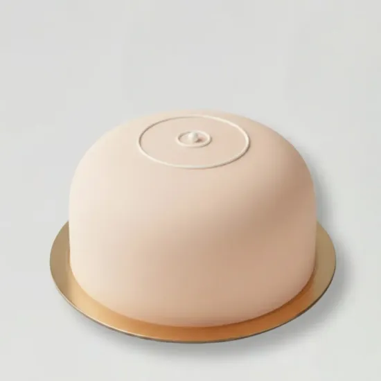 Dome-Shaped Cake by Blue Heaven Pastel dome-shaped whipped cream cake with minimal top detailing by Blue Heaven