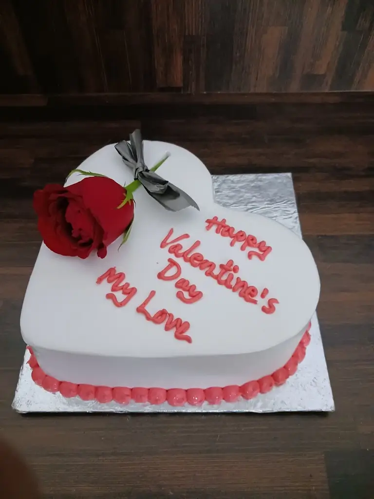 Heartfelt Valentine’s Day cake with red rose and love message by Blue Heaven, online cake delivery in Bhopal