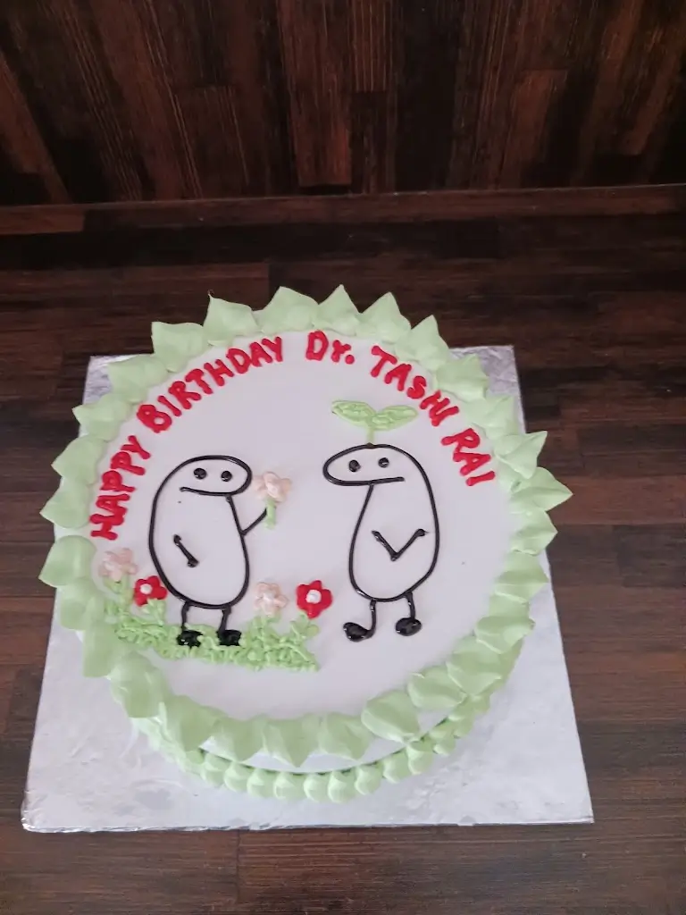 Personalized doodle theme birthday cake with cartoon design by Blue Heaven, online cake delivery in Bhopal